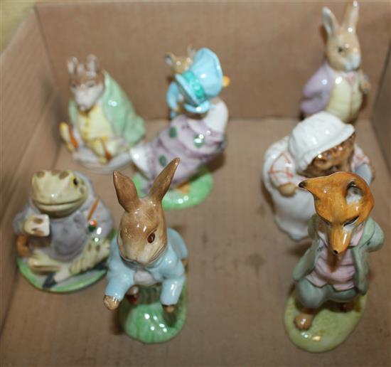 Eight Beswick, Royal Doulton and Royal Albert Beatrix Potter figures